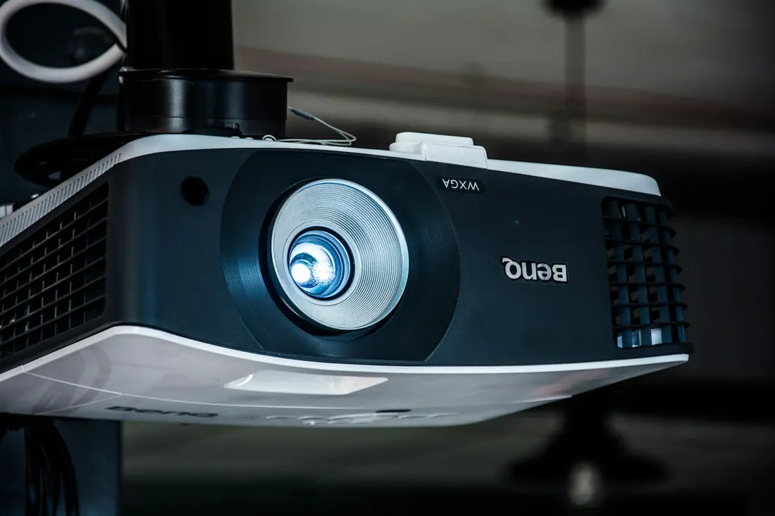 A BenQ projector on a table
